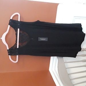 Cable & Gauge black tank with crochet design on back of neck and straps.